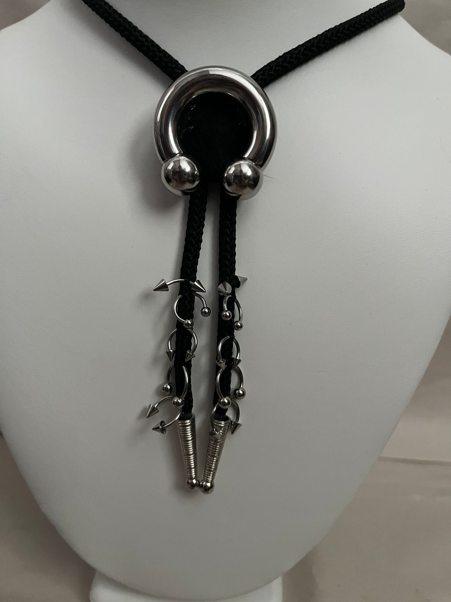 pierced bolo tie